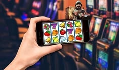 Monopoly Live casino presented on mobile device in Pakistan with slots and live games